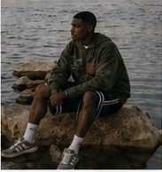 Botanical Hoodie seated editorial view